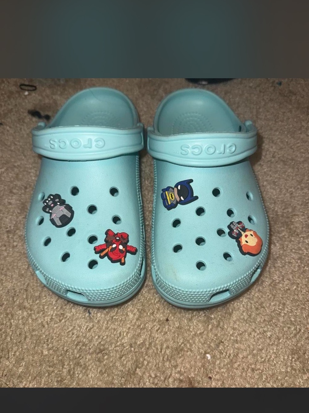 CROCS womens  Light Blue Classic Clogs with Character Jibbitz